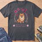 Pomeranian dog with flowers and text "Soft Heart Loyal Soul" on a t-shirt.