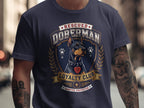 Navy t-shirt with a Doberman design featuring "Rescued Doberman Loyalty Club Adopted Protector".
