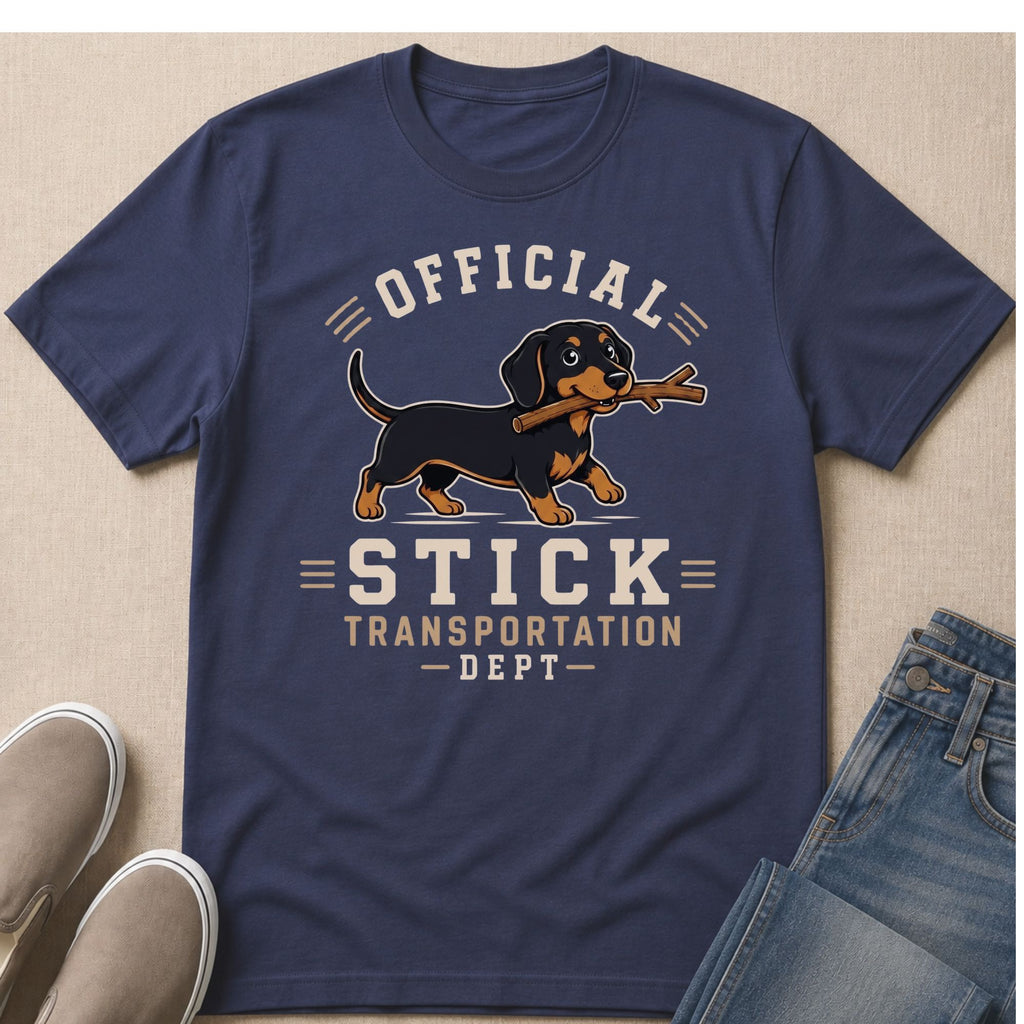 Dachshund on navy t-shirt with "Official Stick Transportation Dept" text.