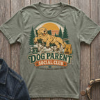 Golden retriever in chair with "Dog Parent Social Club" text.