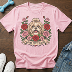 Pink t-shirt with Shih Tzu surrounded by roses and banner reading "LOYAL LOVE BLOOMS".