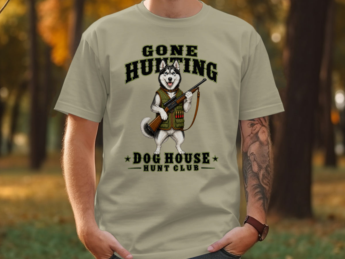 T-shirt with husky illustration holding a rifle and text "Gone Hunting Dog House Hunt Club".