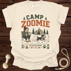 Cream t-shirt with "Camp Zoomie Activities Begin At 5:43 AM" graphic.