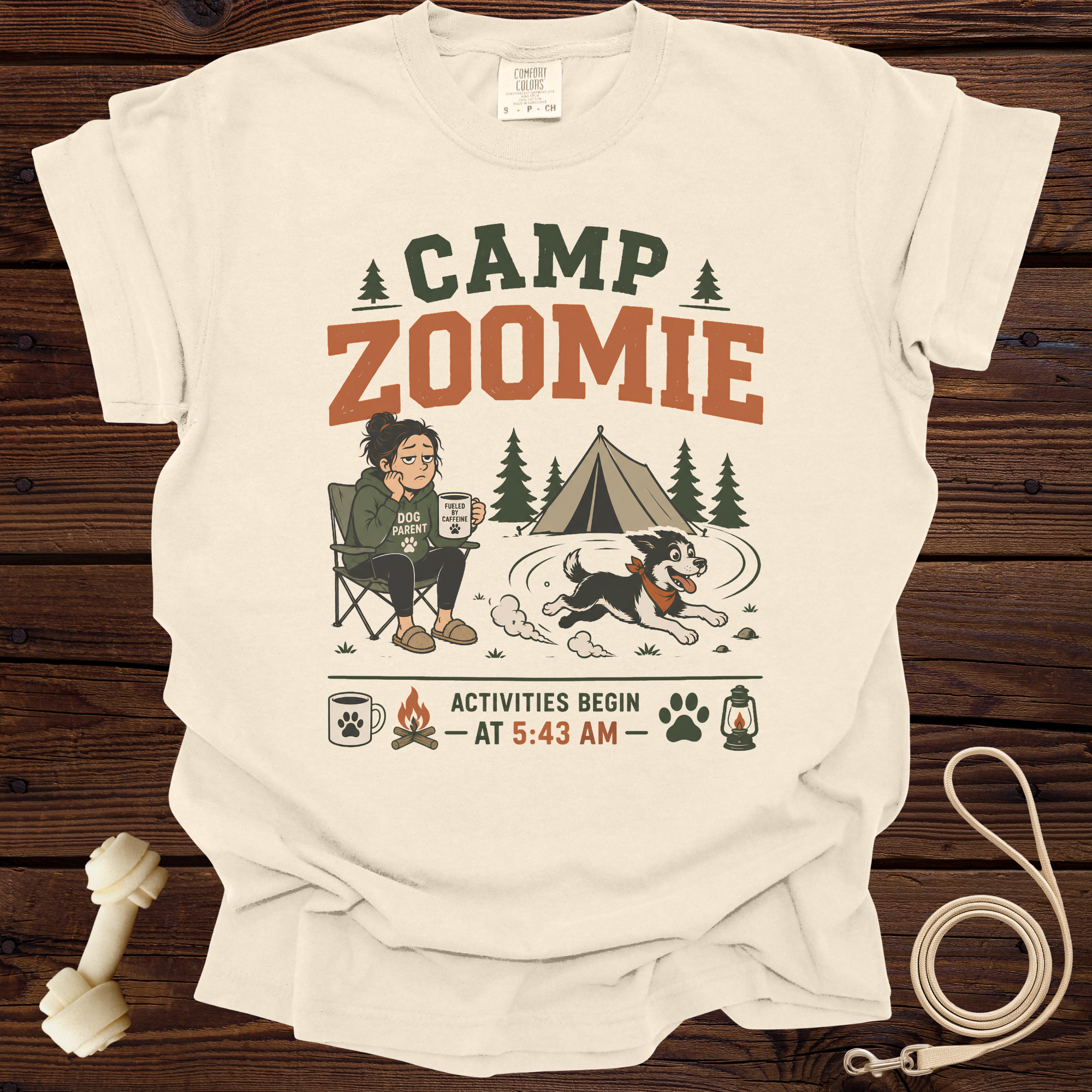 Cream t-shirt with "Camp Zoomie Activities Begin At 5:43 AM" graphic.