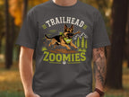 German Shepherd running with stick, text "TRAILHEAD ZOOMIES"