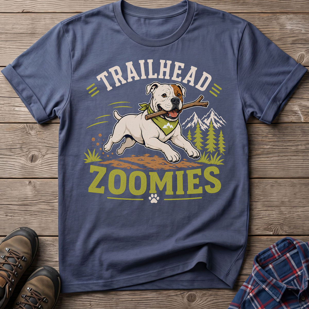 American Bulldog with stick, mountains, and text "TRAILHEAD ZOOMIES".
