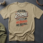 Tan t-shirt with "Club Zoomie No Brakes. No Recall." text and checkered flag graphic.