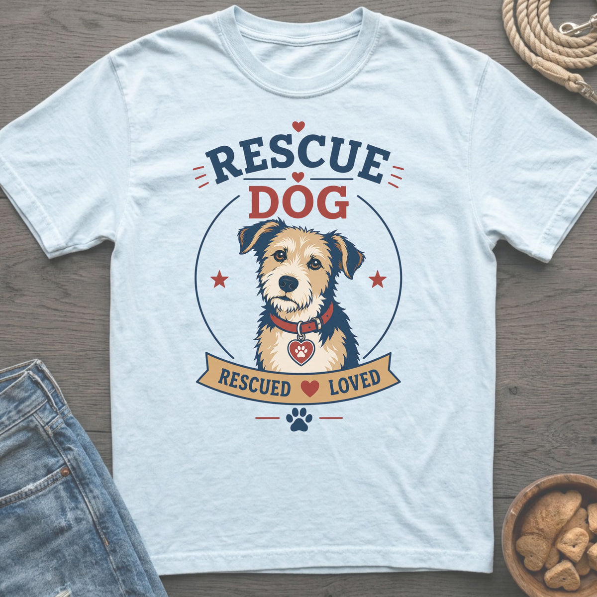 Light blue t-shirt with "RESCUE DOG" and a dog illustration in a circle.