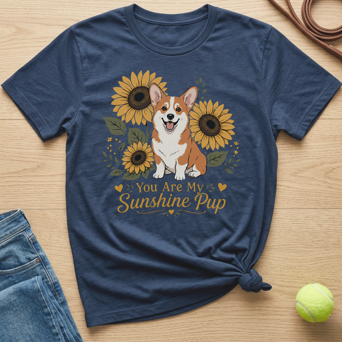Navy t-shirt with a Corgi and sunflowers graphic that reads "You Are My Sunshine Pup".