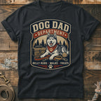 Dog Dad Department graphic on a dark t-shirt featuring a husky, toolbox, leashes, and ball.