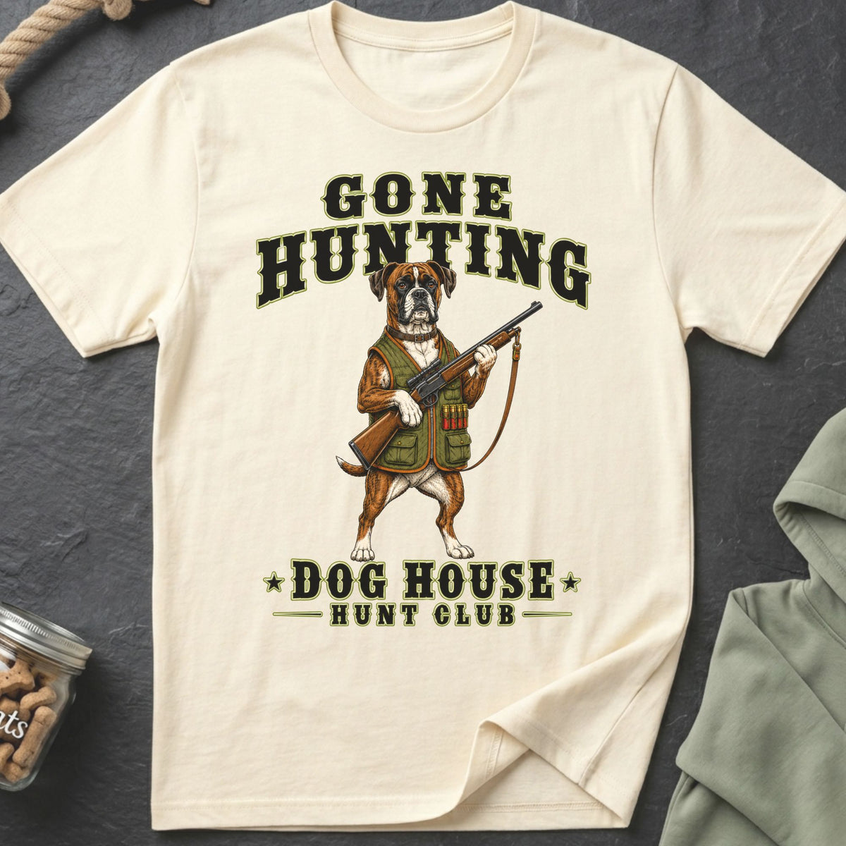 T-shirt with illustration of a boxer dog holding a rifle, "Gone Hunting" and "Dog House Hunt Club" text.