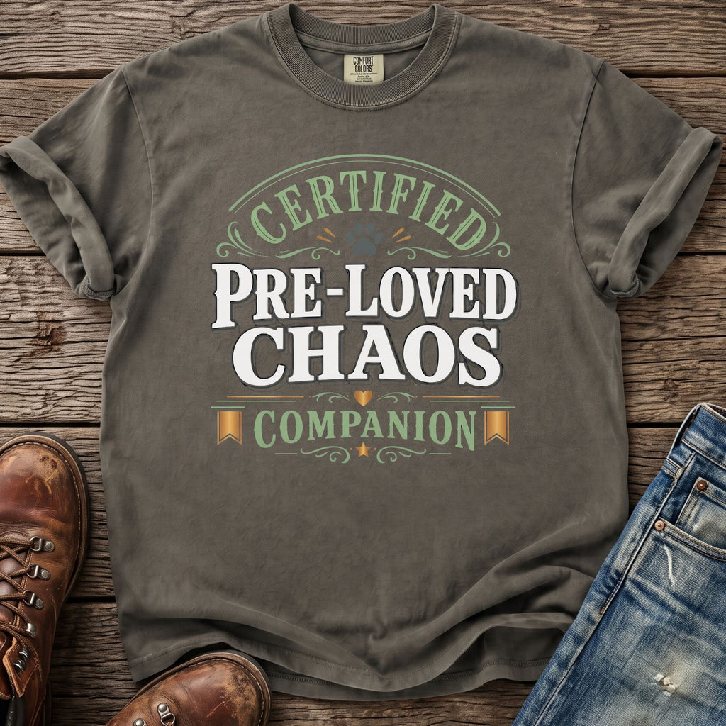 T-shirt with "Certified Pre-Loved Chaos Companion" text and a paw print.