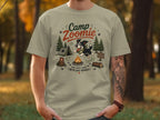 T-shirt graphic: dog camping with text "Camp Zoomie For Good Dogs With Bad Brakes".