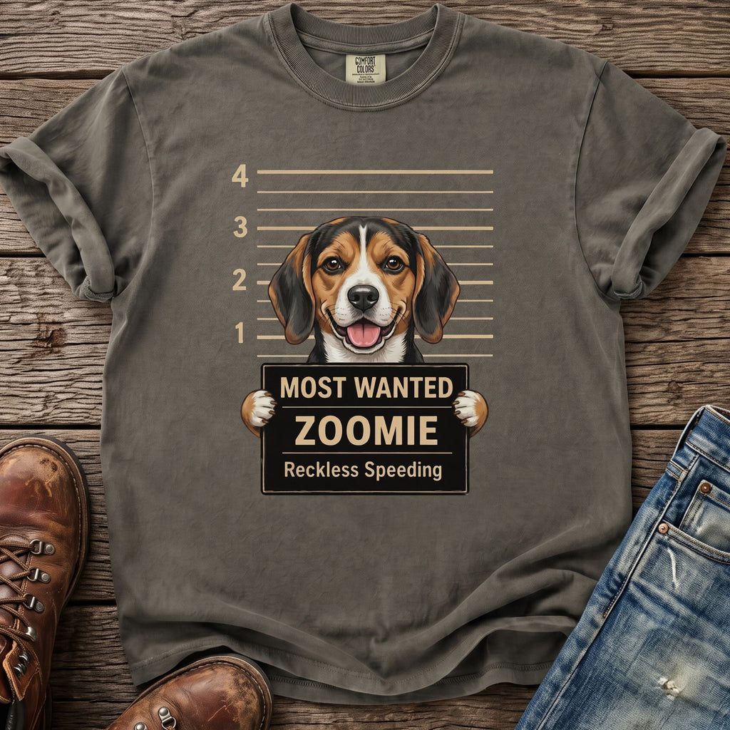 T-shirt graphic of a beagle in a mugshot with "Most Wanted Zoomie Reckless Speeding" text.