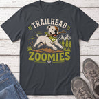 Dog with stick on bandana running with text "TRAILHEAD ZOOMIES"