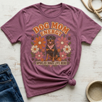 Purple t-shirt with a Rottweiler and floral design, reads "Dog Mom Energy Spoiled Dogs Live Here."