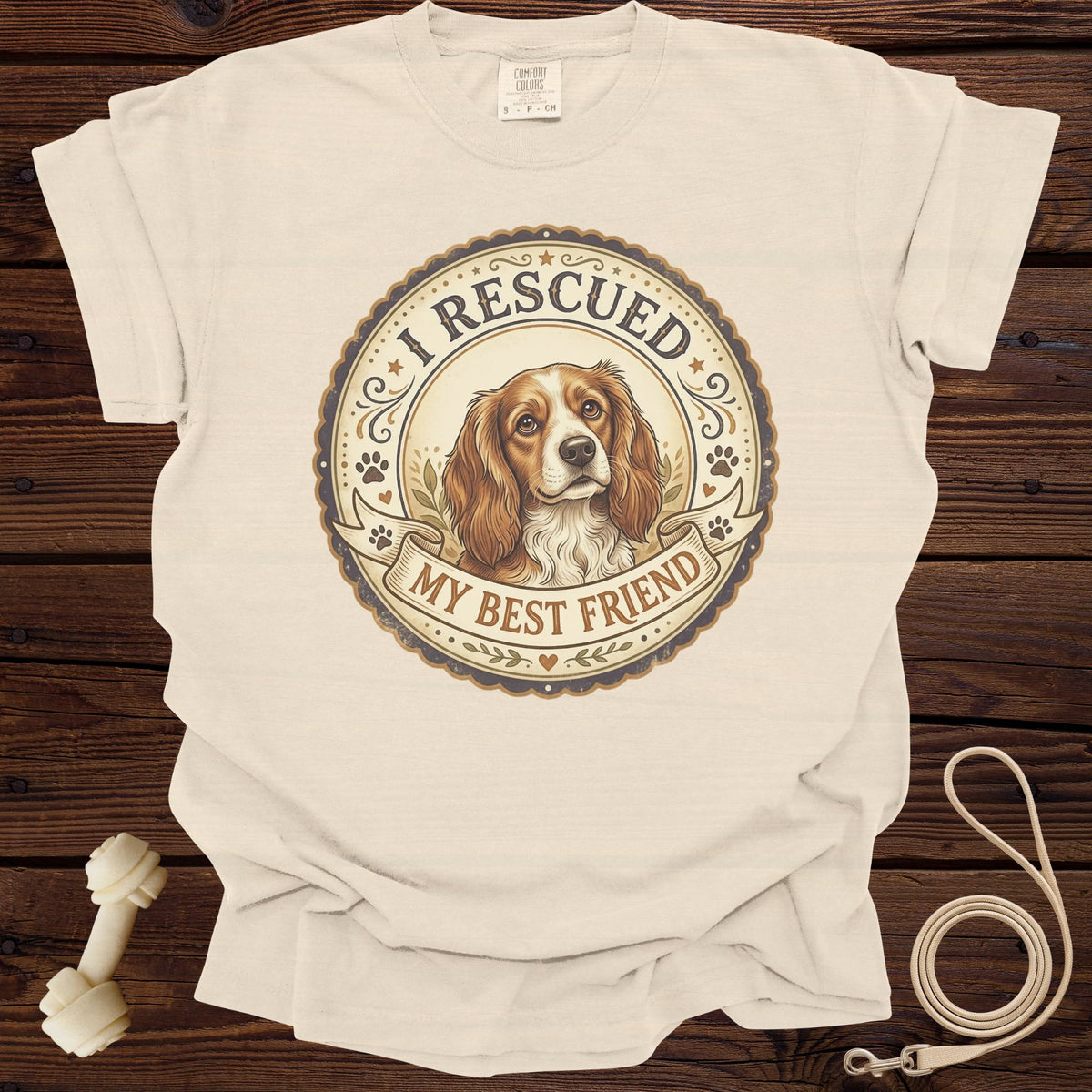 T-shirt with a dog portrait and text "I RESCUED MY BEST FRIEND".