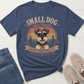 T-shirt with a miniature schnauzer, mountains, and text "Small Dog Big Heart".