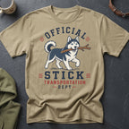 Tan t-shirt with husky holding stick and text "Official Stick Transportation Dept"