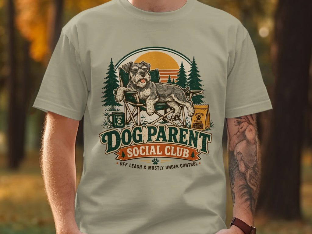 Dog Parent Social Club graphic with schnauzer relaxing in a chair.
