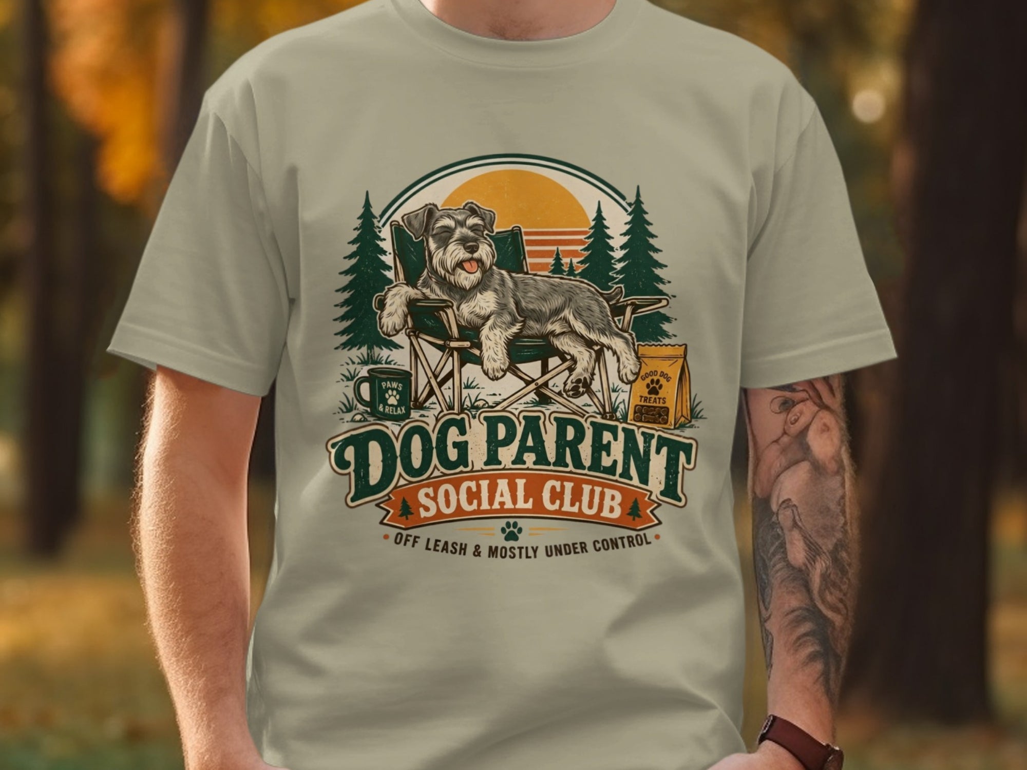Dog Parent Social Club graphic with schnauzer relaxing in a chair.