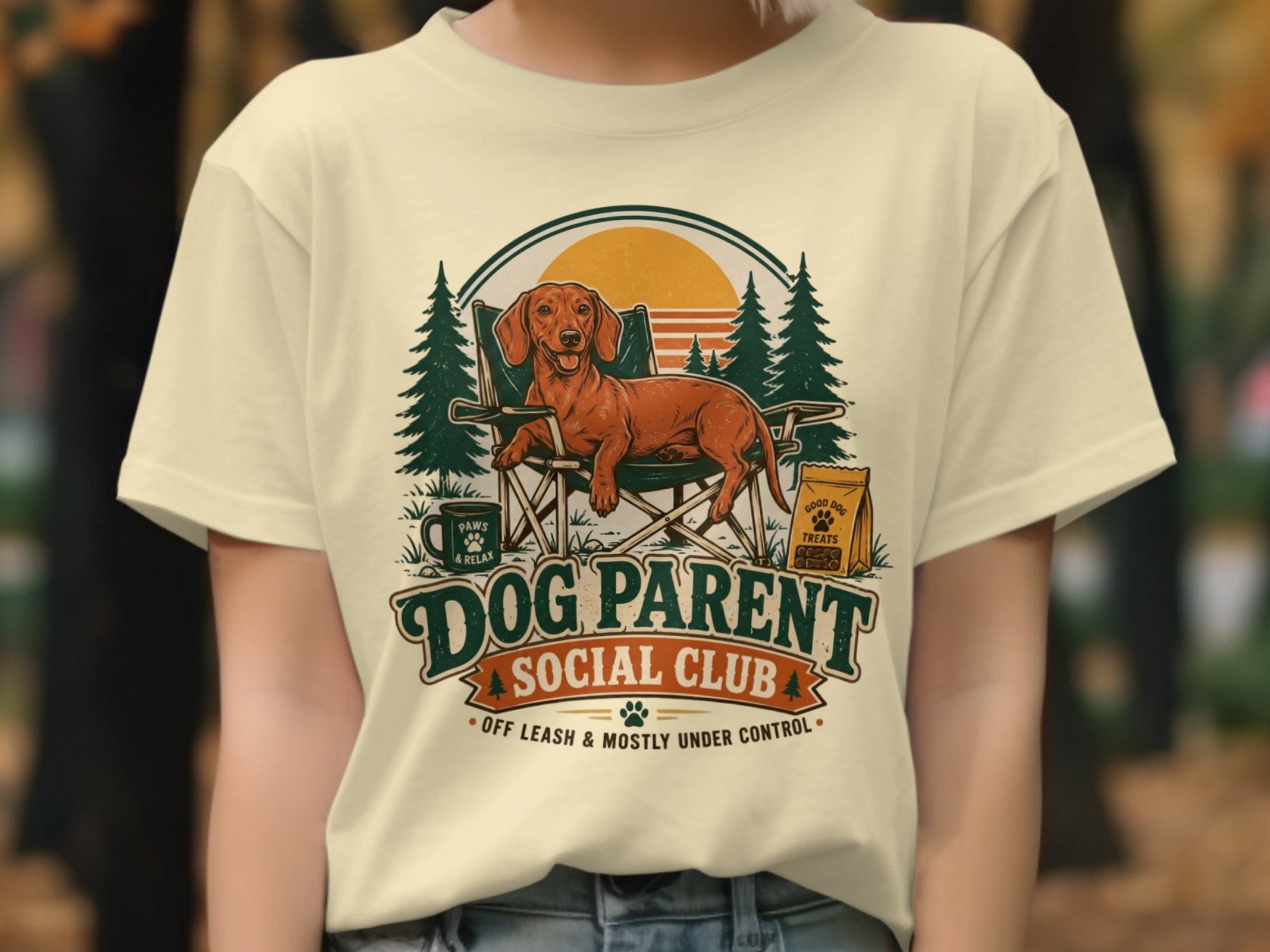 Dachshund relaxing in a camping chair with "Dog Parent Social Club" text.