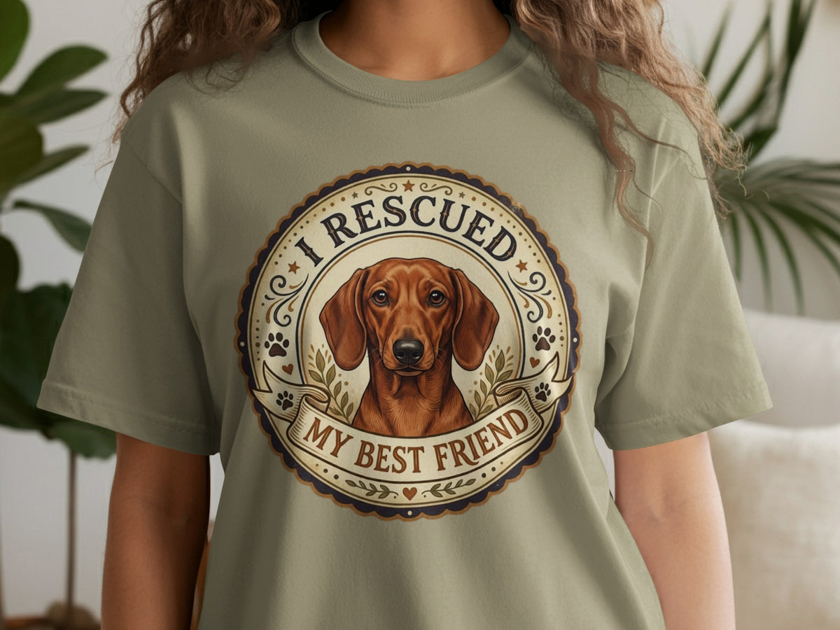 T-shirt with a round graphic of a dachshund and the text "I RESCUED MY BEST FRIEND".
