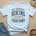 Light blue t-shirt with text "MY FAVORITE HIKING PARTNER HAS FOUR PAWS".