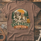 Shih Tzu on camping chair with "Dog Parent Social Club" text and outdoor scene.