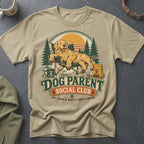Golden retriever relaxing in a chair with "Dog Parent Social Club" text.