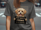 T-shirt graphic of a dog in a mugshot holding a sign reading "Most Wanted Zoomie Reckless Speeding".