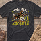 Dark grey t-shirt graphic with a Cavalier King Charles Spaniel running with a stick, text "TRAILHEAD ZOOMIES".