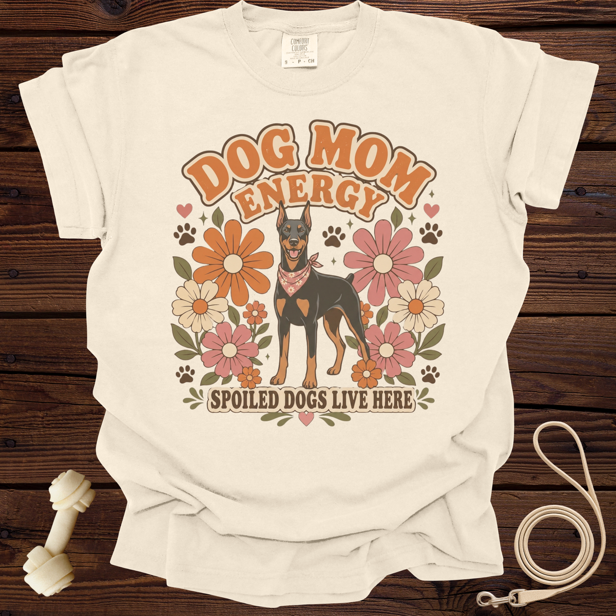 Cream t-shirt with "Dog Mom Energy" and "Spoiled Dogs Live Here" text, featuring a Doberman.