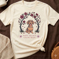Dachshund illustration with floral arch and text "Soft Heart Loyal Soul".