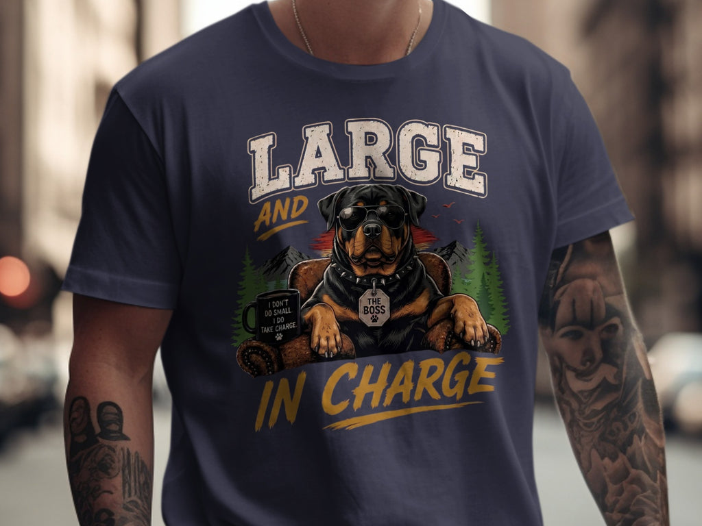 Rottweiler wearing sunglasses with text "LARGE AND IN CHARGE" on a t-shirt.