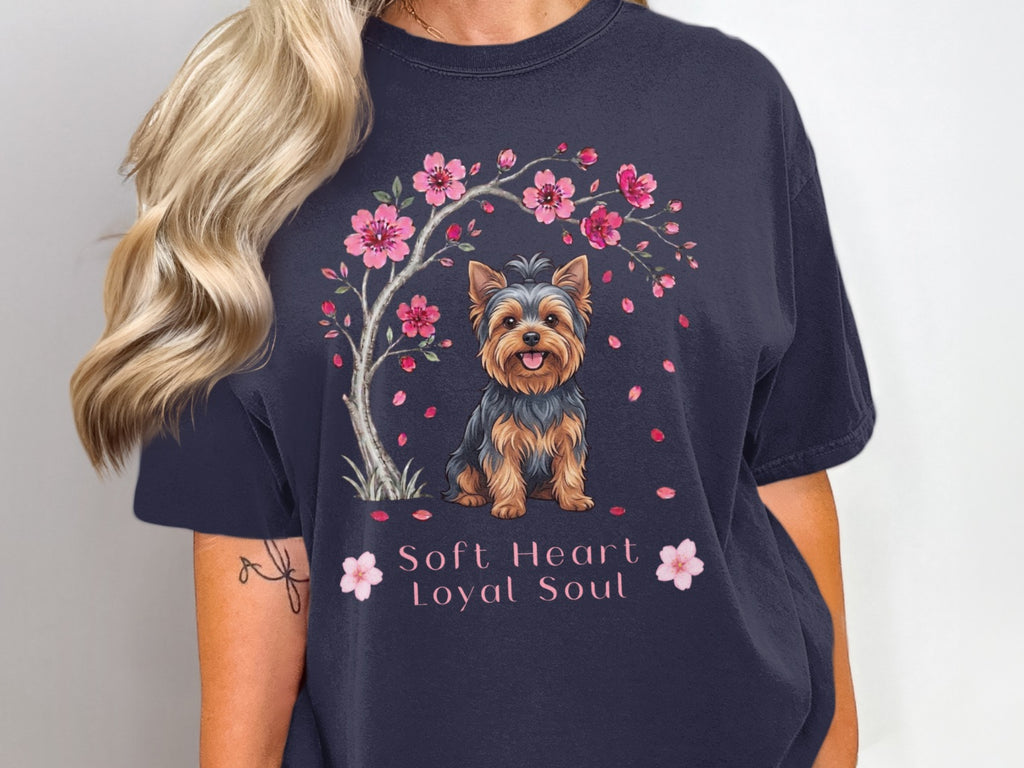 Yorkshire Terrier under a cherry blossom tree with text "Soft Heart Loyal Soul".