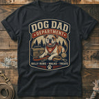 Dog Dad Department graphic on a dark t-shirt with a bulldog, leash, and treats.