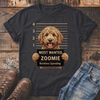 Dark t-shirt with a doodle dog mugshot graphic reading "Most Wanted Zoomie Reckless Speeding."