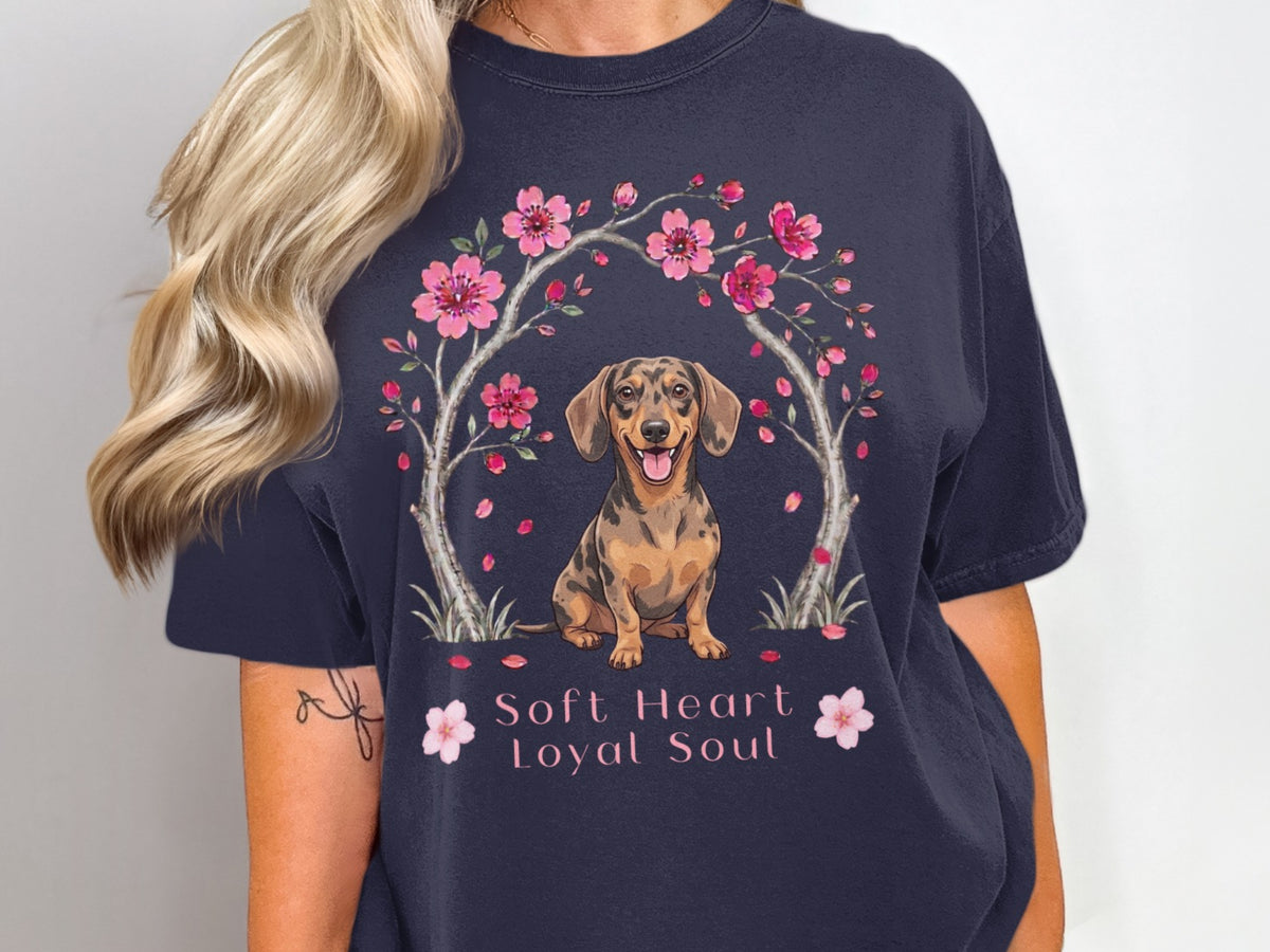 Dachshund under a cherry blossom arch with text "Soft Heart Loyal Soul".