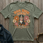 Green t-shirt with "Dog Mom Energy" and a dog surrounded by retro flowers.