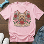 Pink t-shirt with Yorkshire terrier surrounded by roses and text "Loyal Love Blooms".