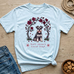 Light blue t-shirt with a schnauzer under a floral arch and text "Soft Heart Loyal Soul".