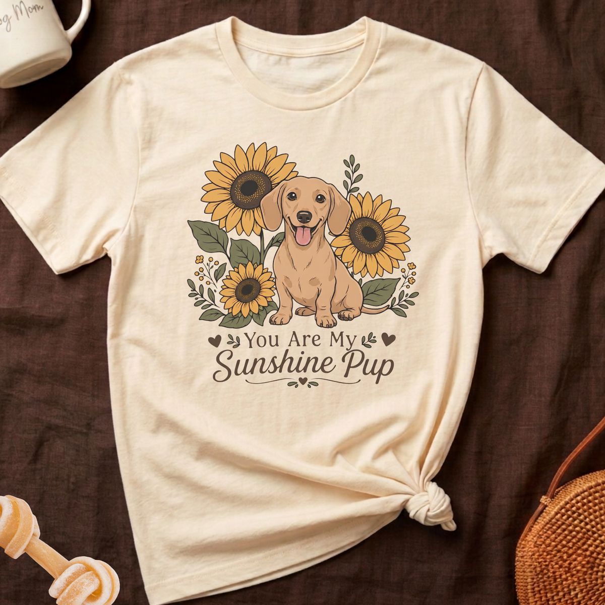 Cream t-shirt with a dachshund and sunflowers graphic that reads "You Are My Sunshine Pup".