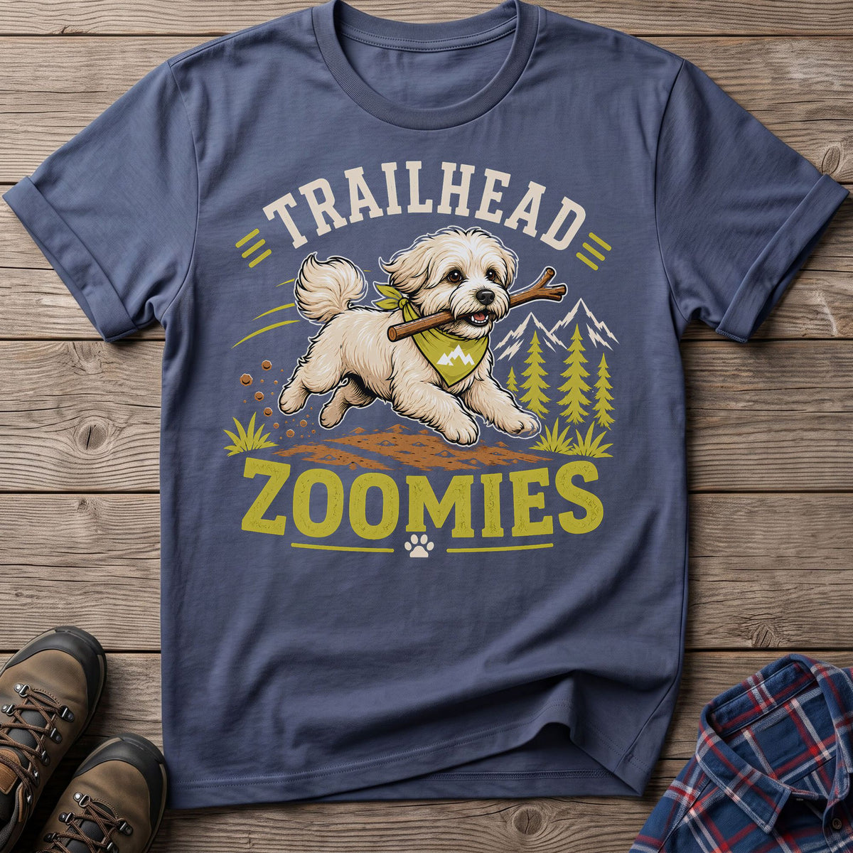 T-shirt graphic with a dog running with a stick, reading "Trailhead Zoomies."