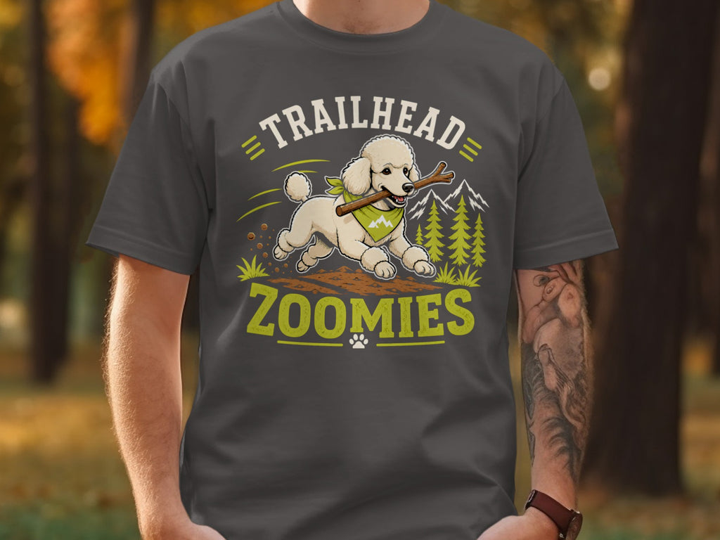 White poodle with bandana runs with stick, text "TRAILHEAD ZOOMIES"