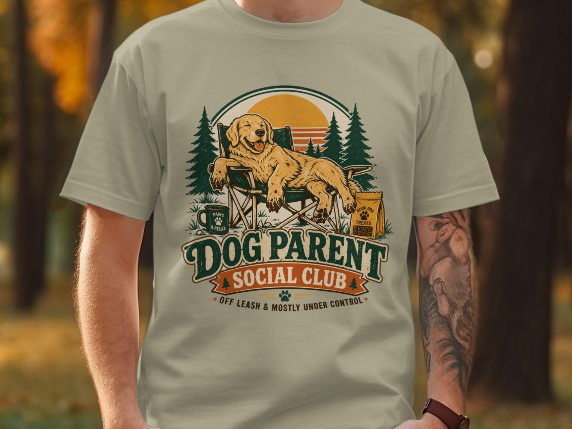 Dog Parent Social Club graphic with a golden retriever on a chair, surrounded by trees.