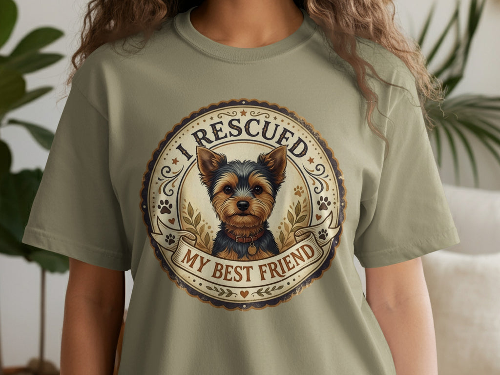 Yorkshire terrier graphic with text "I RESCUED MY BEST FRIEND" on shirt.