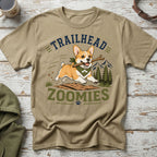 Tan t-shirt with a corgi running with a stick, text "TRAILHEAD ZOOMIES".
