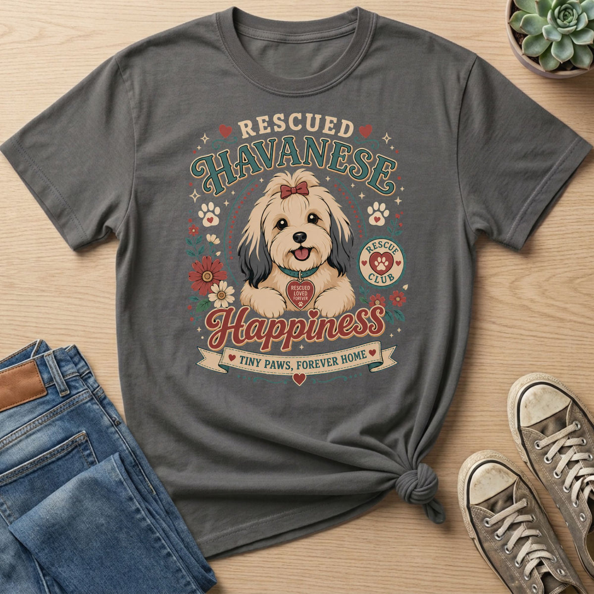 "Rescued Havanese" t-shirt features a dog with "Tiny Paws, Forever Home" text.