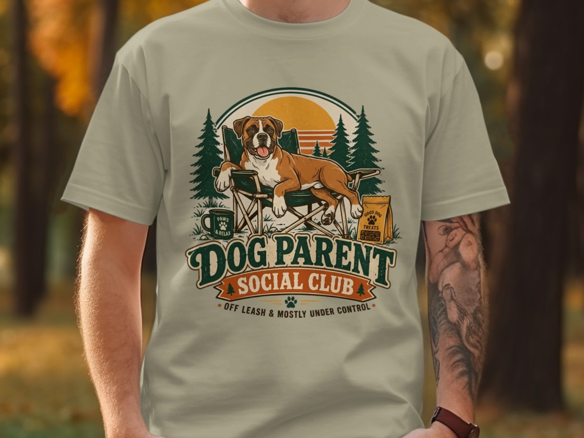 Boxer dog relaxing in a chair with "Dog Parent Social Club" text.
